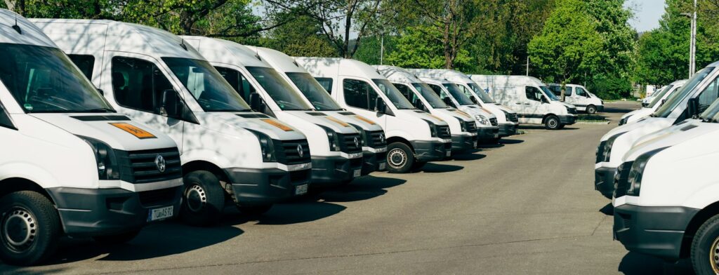 cars parked on parking lot during daytime